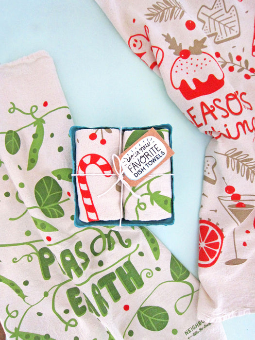 Happy holidays dish towel set photographed with peas and season' greetings towels