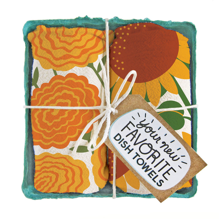 Hello Sunshine dish towel set, folded in a green berry basket tied with a gift tag