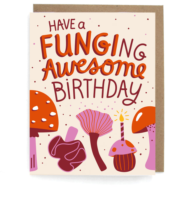 Beige card with mushroom designs, featuring the phrase "Have a funging awesome birthday," with a brown envelope