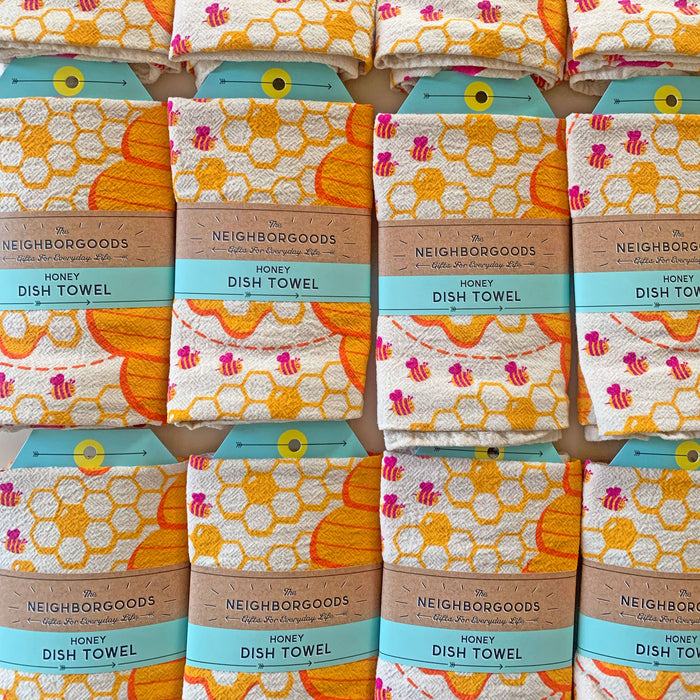 Screen-printed Honey dish towels packaged in branded belly band sleeves