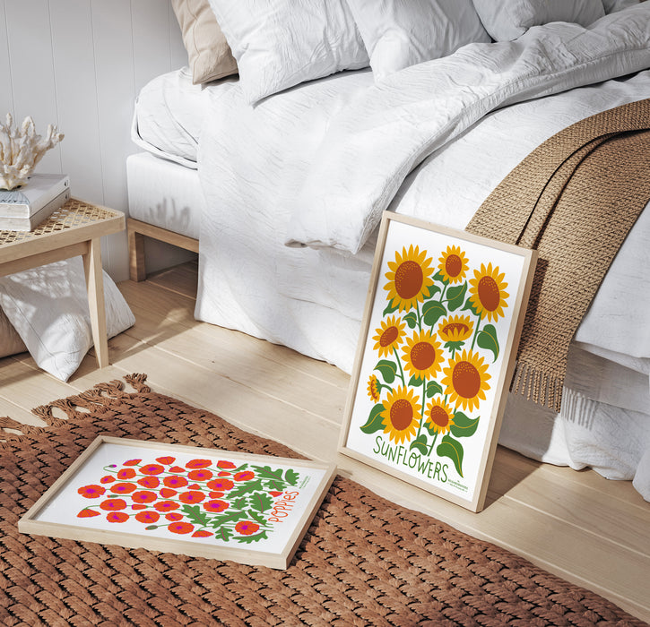 Sunflower and Poppies Neighborgoods prints on the ground of a bedroom