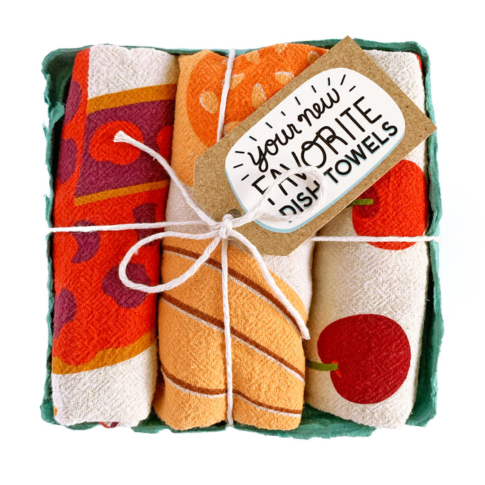 "Yippee pie yay" dish towel set, folded in a green berry basket tied with a gift tag