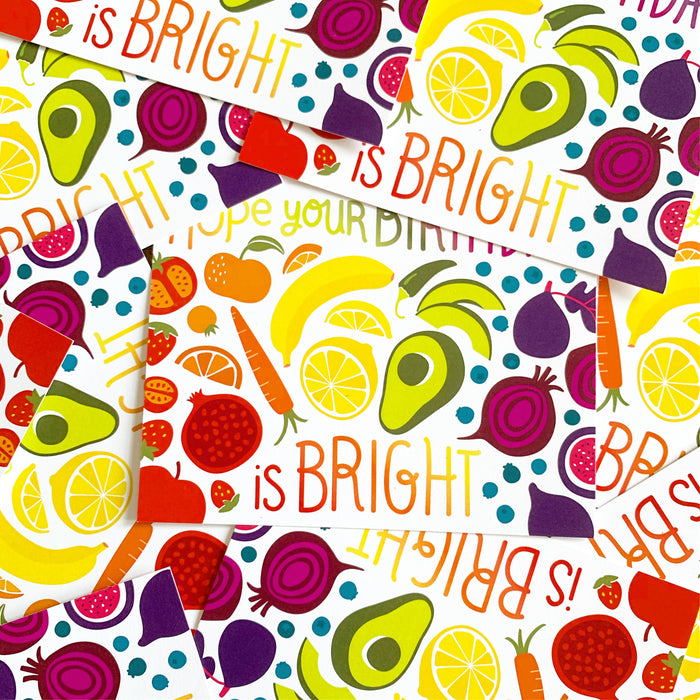 Several food rainbow birthday cards pictured together in a pile