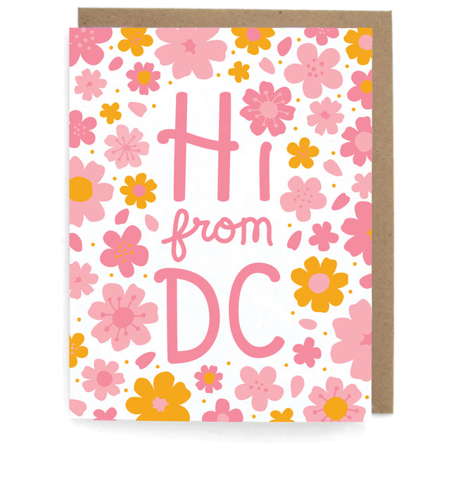 White cards with cherry blossom design, featuring the phrase "Hi from DC," with a brown envelope