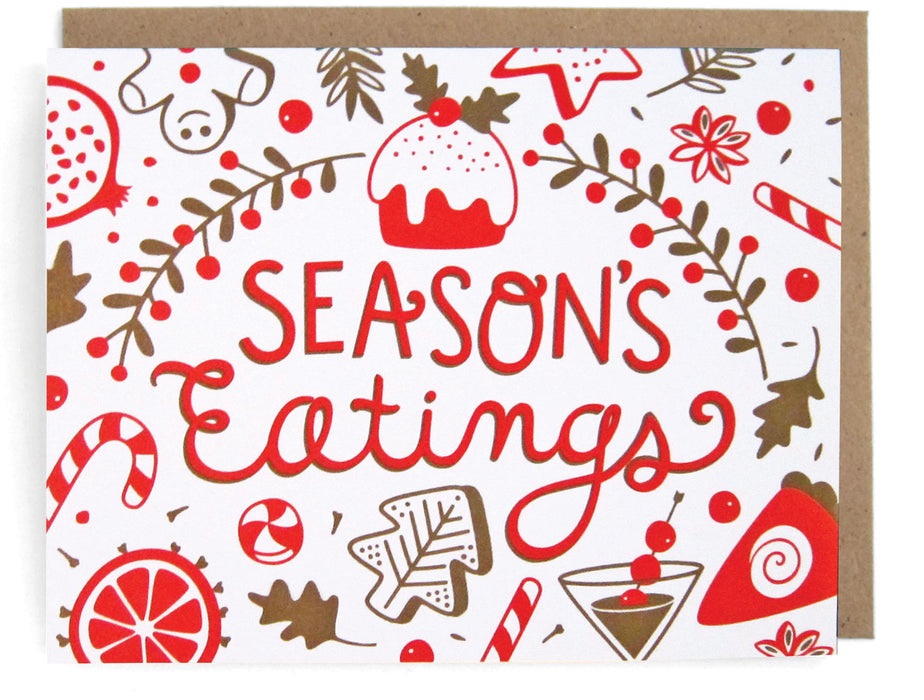 White card with holiday drinks and snacks design, featuring the phrase "Season's Eating," with a brown envelope