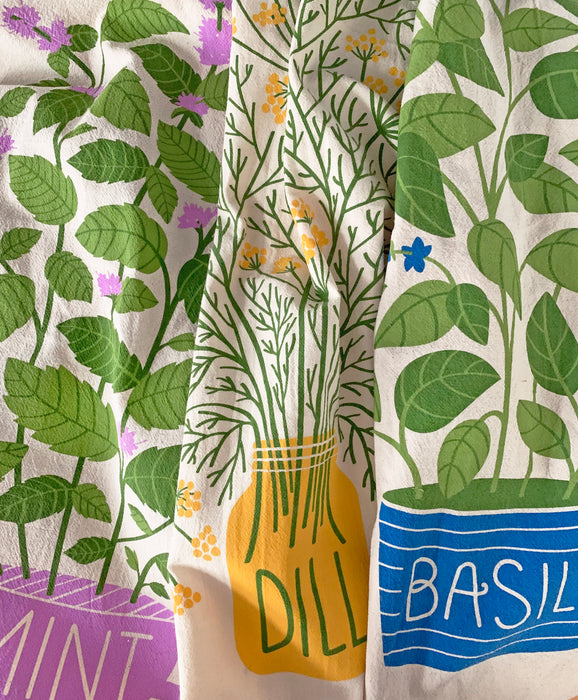 Mint, dill, and basil towels folded together