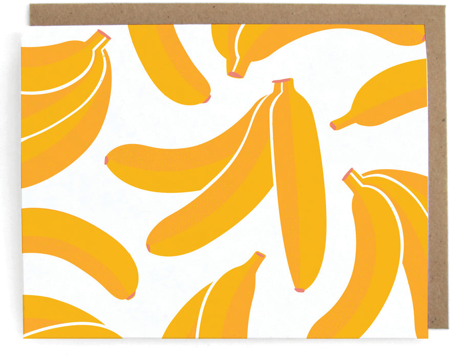 White card with banana pattern, with a brown envelope