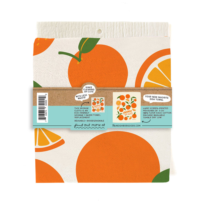 Back of matching dish towel and sponge cloth set with oranges design, featuring the phrase "Orange you glad"