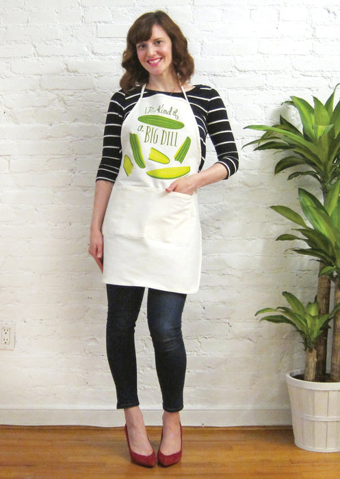 Neighborgoods founder, Jodi, wearing the pickle apron