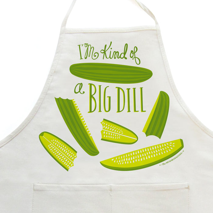 Close-up on white apron with pickle design, featuring the phrase "I'm kind of a big dill"