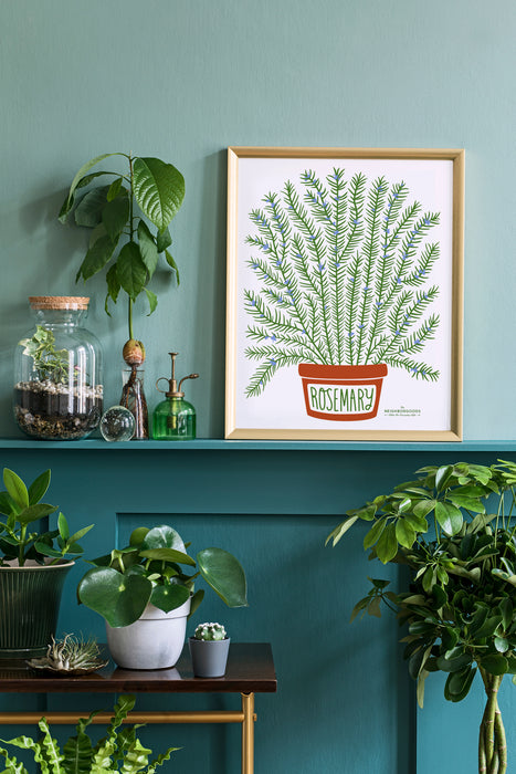 Rosemary print in large size framed amongst several houseplants