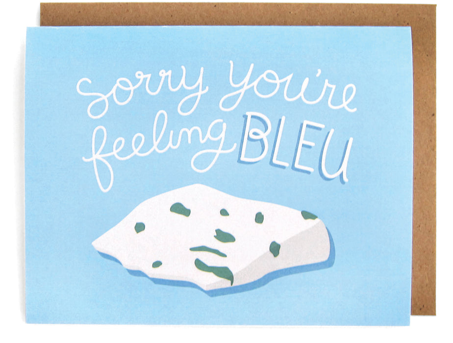 Pale blue card with bleu cheese design, featuring the phrase "Sorry you're feeling bleu," with a brown envelope