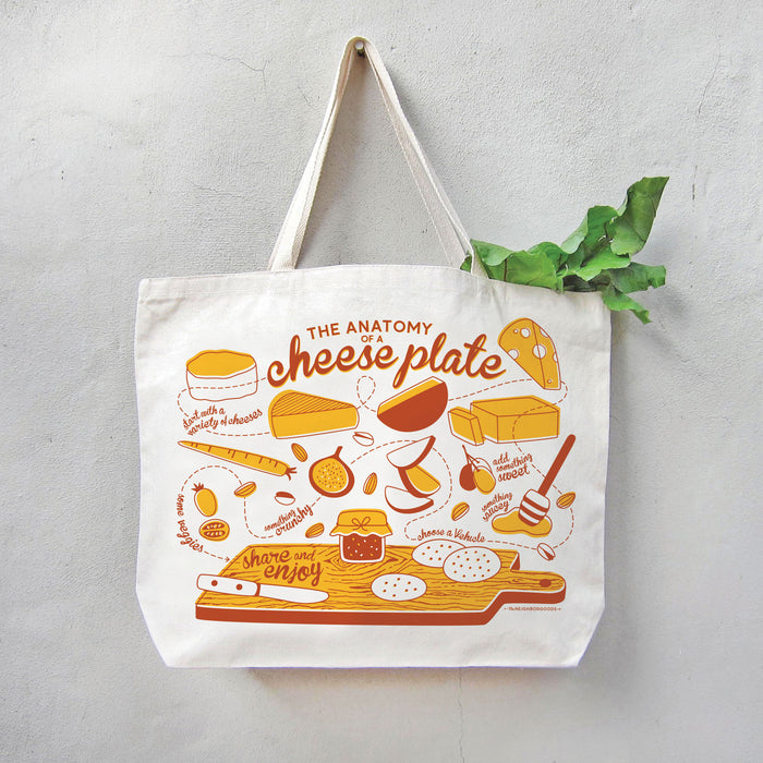 Cheese tote holding produce, hanging on a wall