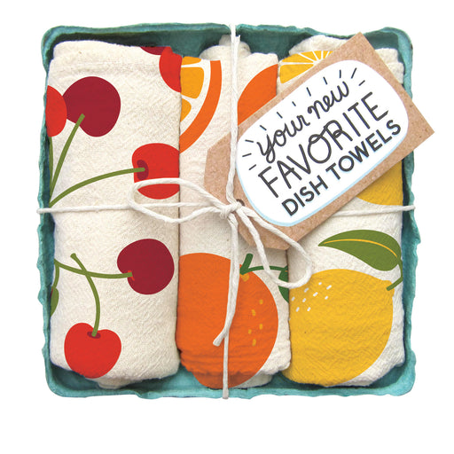 Fruit stand dish towel set, folded in a green berry basket tied with a gift tag