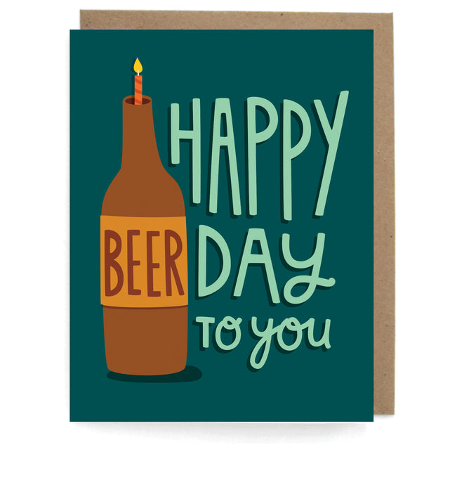 Dark green card that pictures a bottle of beer with a lit candle, featuring the phrase "Happy beerday to you," with a brown envelope