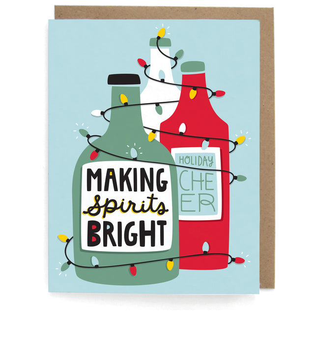 Pale blue card with bottles wrapped in string lights, featuring the phrase "Making spirits bright; Holiday cheer," with a brown envelope