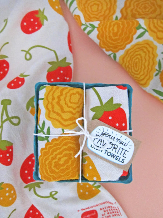 "Mari Berry" dish towel set phtotographed alongside strawberry and marigold dish towels