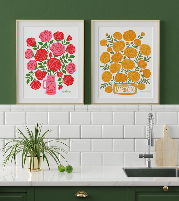 Roses and Marigolds prints framed above a sink in a kitchen