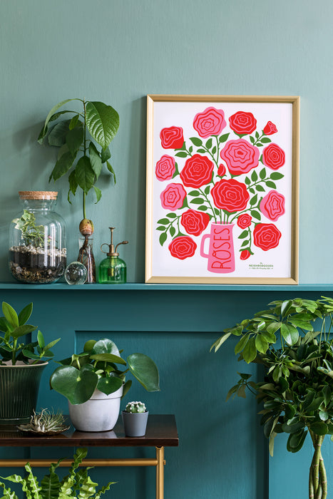 Roses print in medium size amongst several houseplants