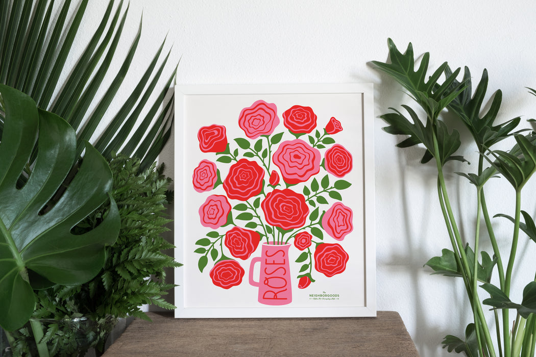 Roses print in small size amongst several houseplants