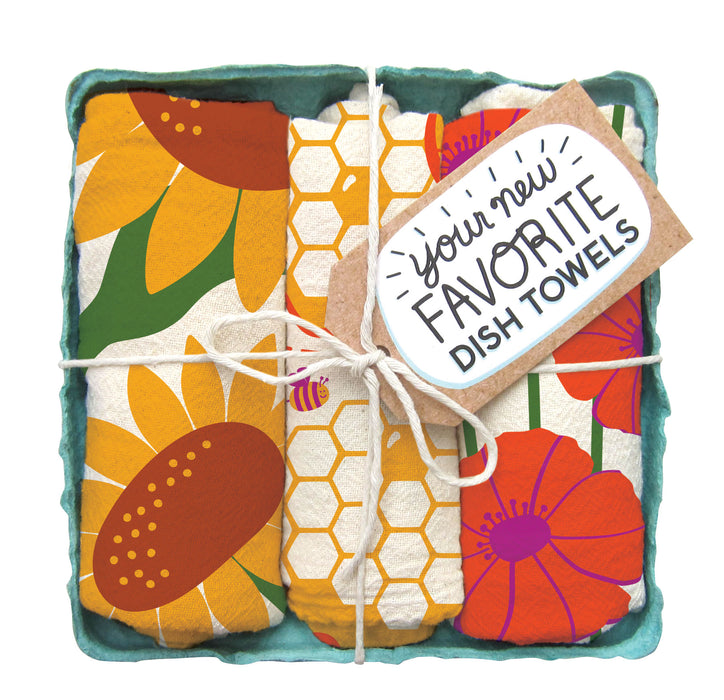 Pollinator Garden dish towel set, folded in green berry basket tied with a gift tag 