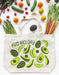 Avocado tote bag photographed with an array of produce