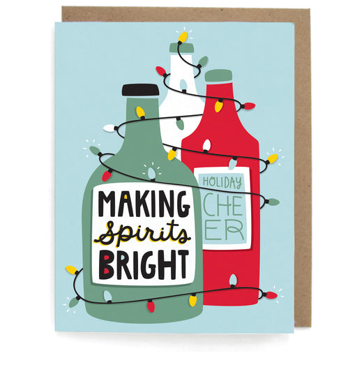 Pale blue card with bottles wrapped in string lights, featuring the phrase "Making spirits bright; Holiday cheer," with a brown envelope
