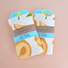 Screen-printed Peach dish towels packaged in branded belly sleeves